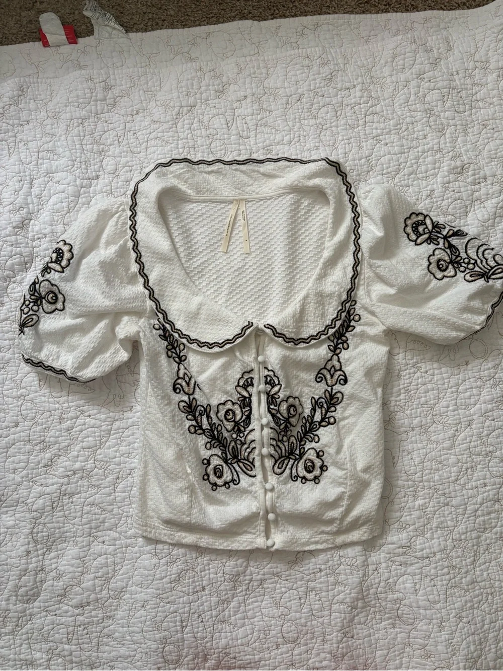 Anthropologie White Puff Sleeve Blouse with Black Floral Embroidery